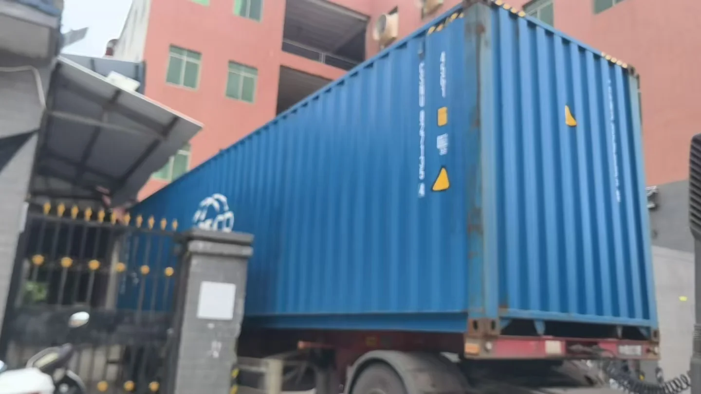 Export container positioned at the manufacturing facility
