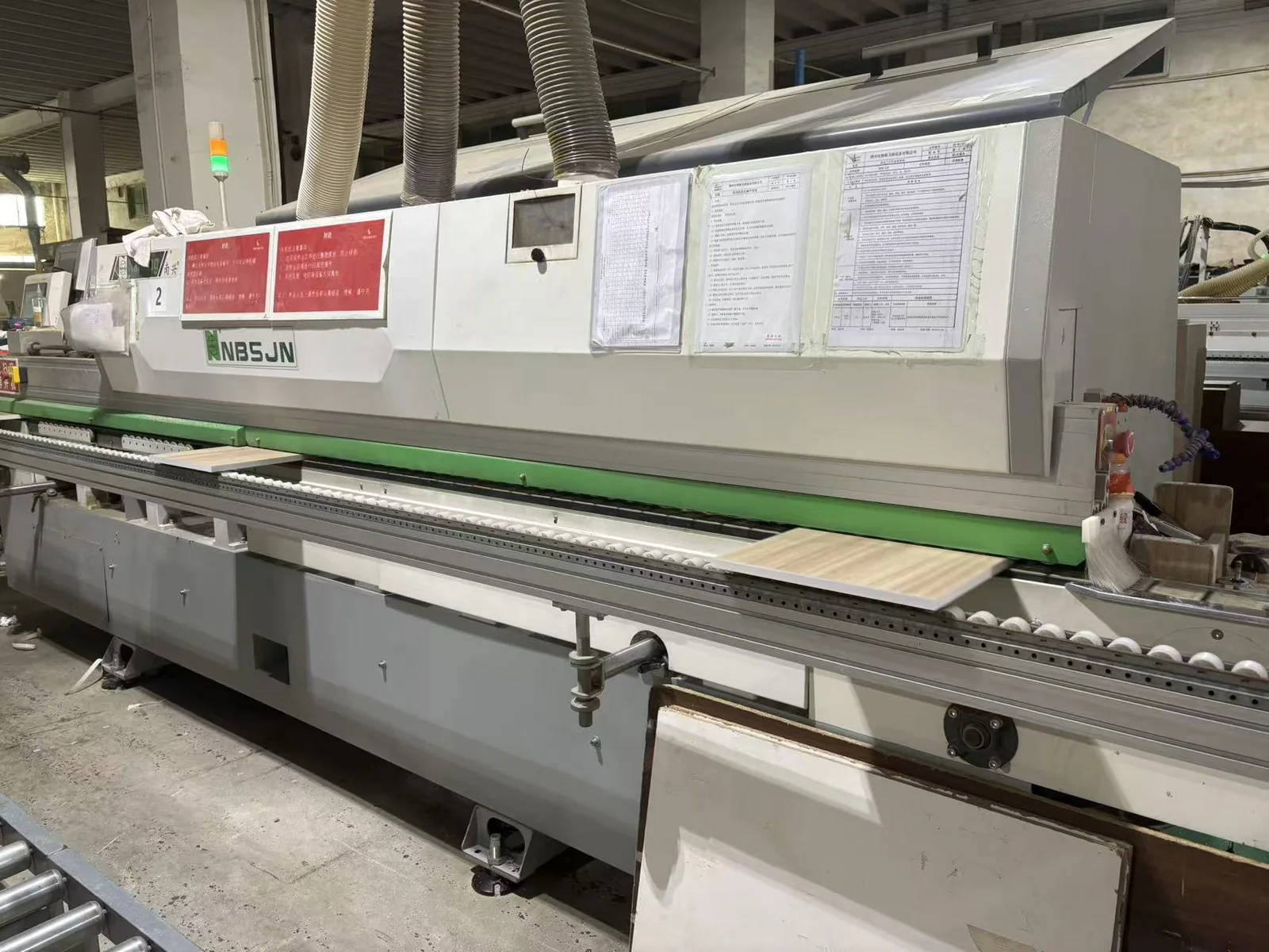 Edge banding equipment used in cabinet production